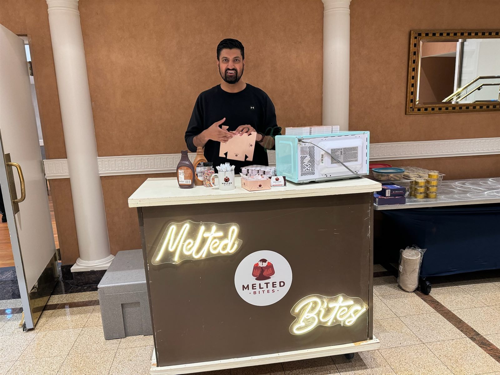 Melted Bites cart set up for an elegant event